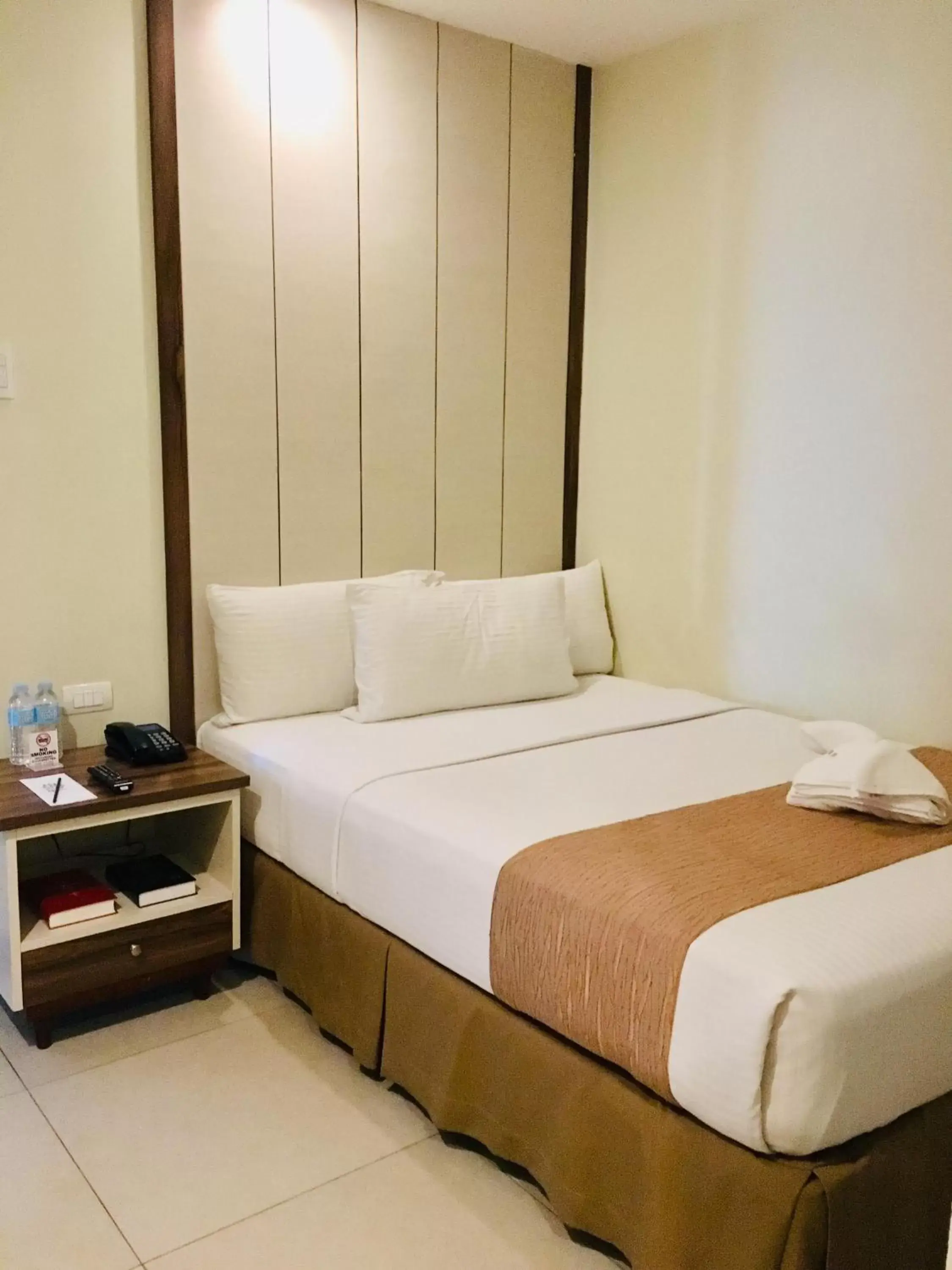 Bed in Belian Hotel